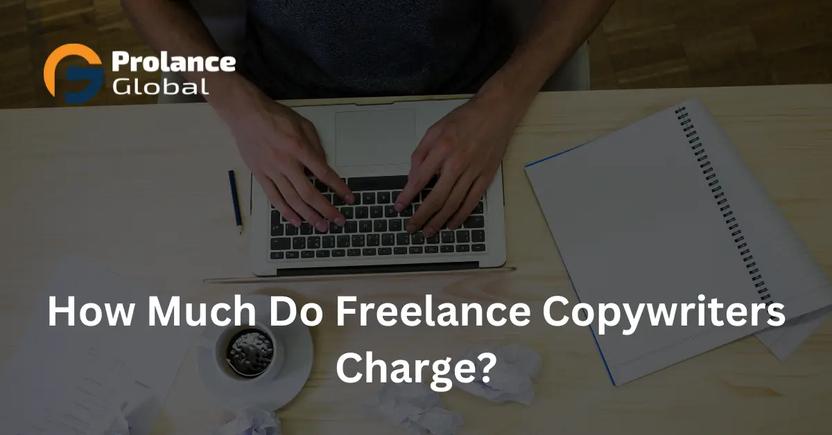 A person working on a laptop at a wooden desk, with a cup of coffee nearby and crumpled paper scattered around. The image includes a notebook, pen, and the text "How Much Do Freelance Copywriters Charge?" with the logo of Prolance Global in the top left corner.